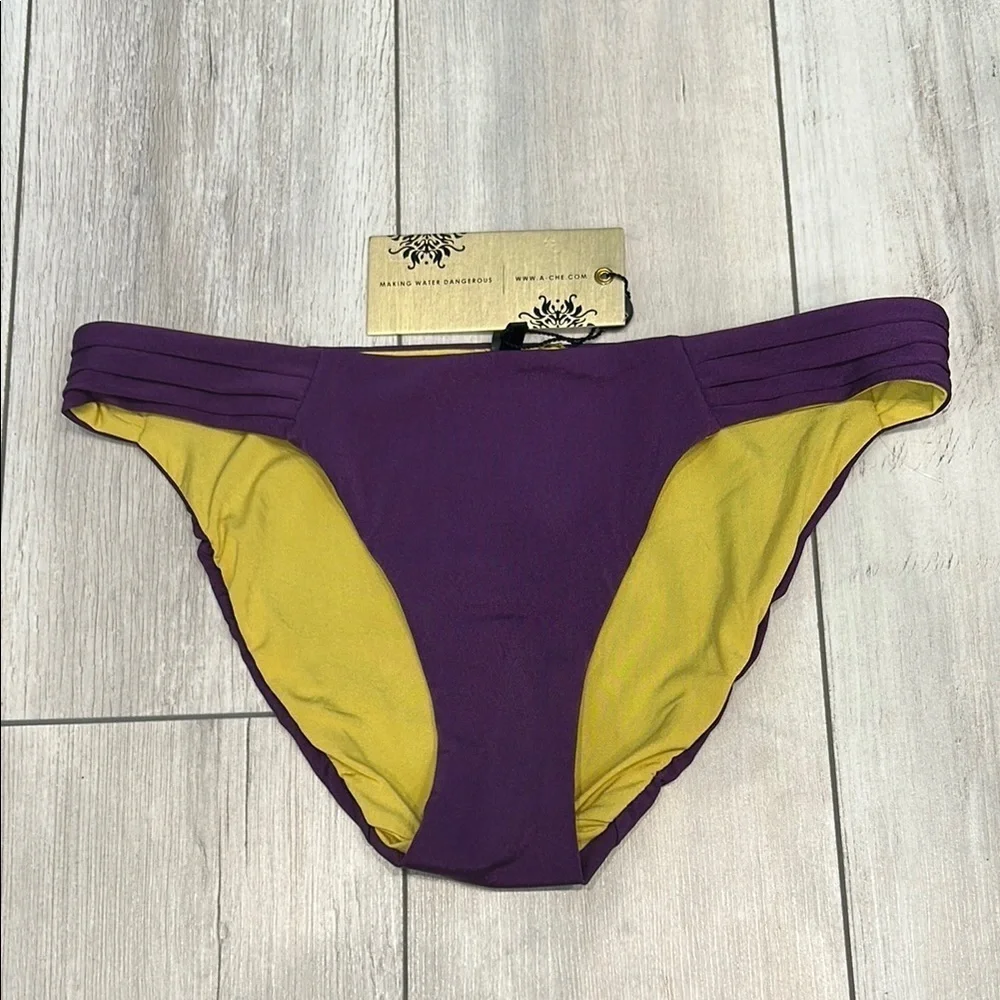 A. Che reversible swim bikini bottom Purple yellow size small